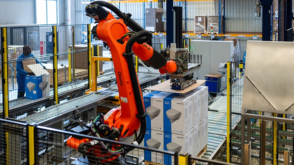 Obelix prepares the pallet with the ceramic appliances for transportation.