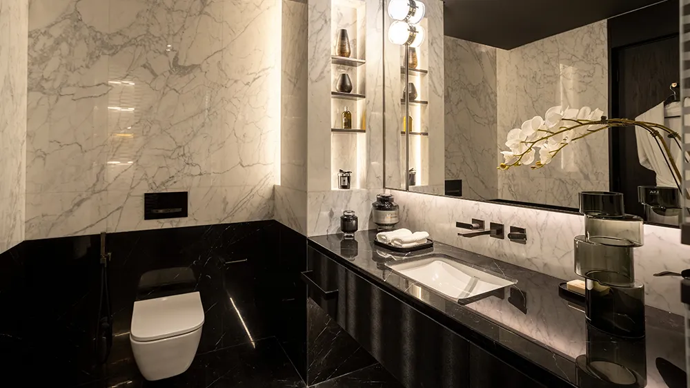Elegance and functionality in the guest bathrooms of the apartments in the Da Vinci Tower: Geberit Smyle toilets and VariForm washbasins. (Photo)