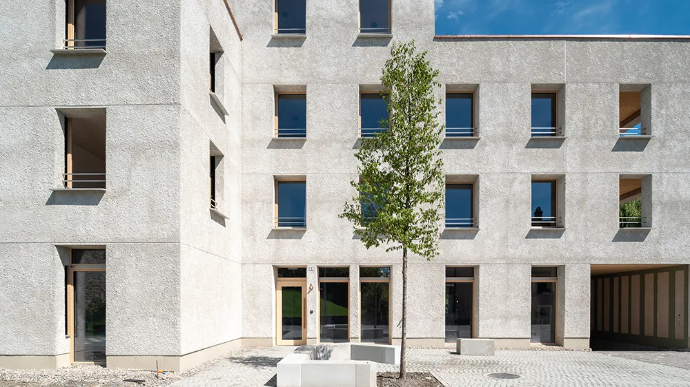 Close-up of the multifamily house Openly Valley in Widnau, Switzerland, the largest hemp house in Europe. (Photo)