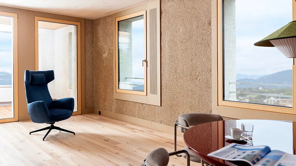 Room inside the multifamily house Openly Valley in Widnau, Switzerland, the largest hemp house in Europe. (Photo)